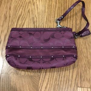 Purple coach wristlet